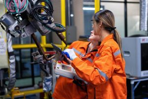 girl engineer commissioning operating programming 2023 04 24 22 53 12 utc e1693346753919.jpg